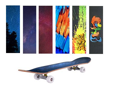 Colorful printed skateboard grip tape sheets and a skateboard